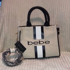 Bebe Cream and Black mini Satchel NWT .